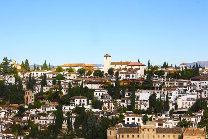 Albayzin and Sacromonte Guided Walking Tour in Granada - Plaza de Isabel la Católica and Granada’s central story