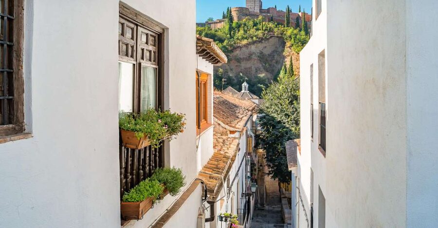 Granada: Alhambra Full Complex & Andalusi Monuments Tickets - Entering the Alhambra complex