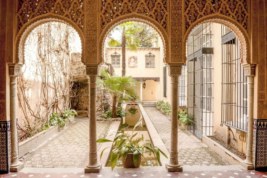 Granada: Alhambra & Gardens Tour w/Nasrid Palaces Option - The Justice Gate, forest, and Charles V Palace