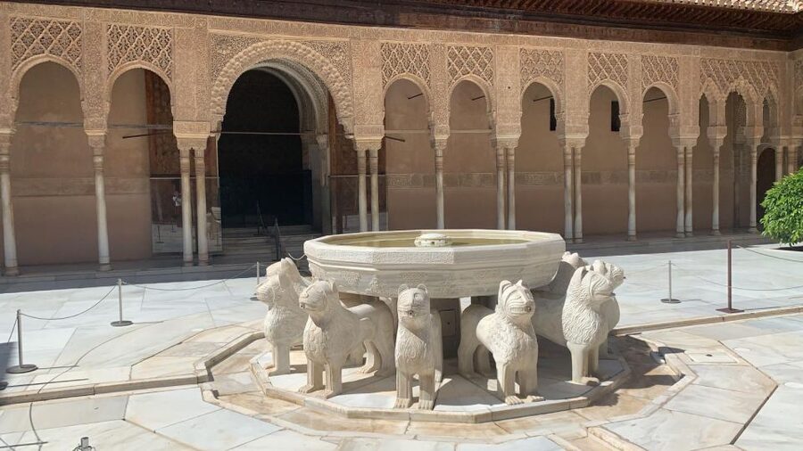 Granada: Alhambra Guided Tour w/ Nasrid Palaces & City Pass - Nine bus rides and one tourist train trip