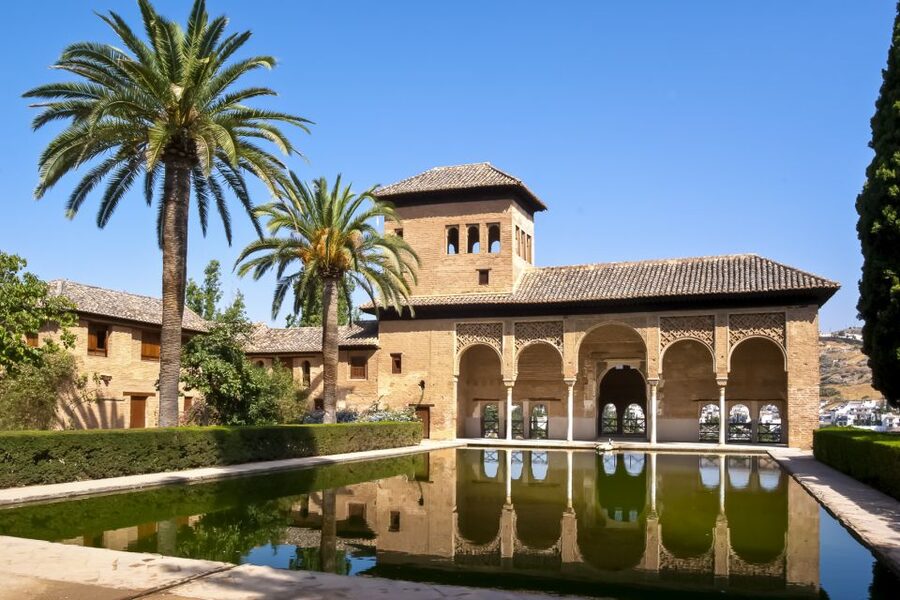 Granada: Alhambra Small Group Tour with Nasrid Palaces - Carlos V Palace and the change in architecture