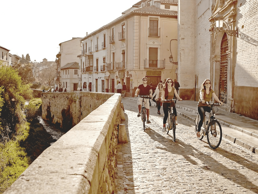 Granada: Electric Bike Tour of Albayzin and Sacromonte - Riding from Carrera del Darro into Granada’s old quarter