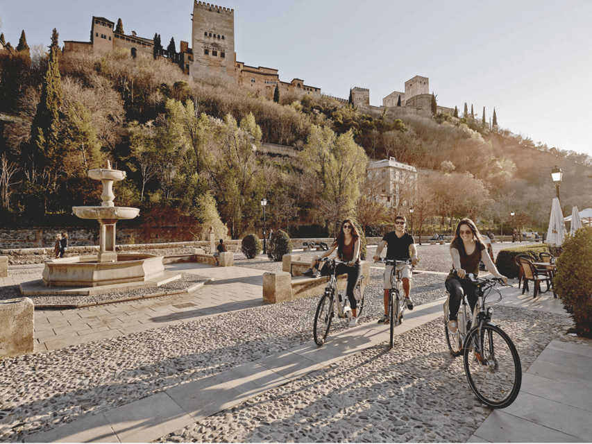 Granada: Electric Bike Tour of Albayzin and Sacromonte - Paseo de los Tristes and the first Alhambra view