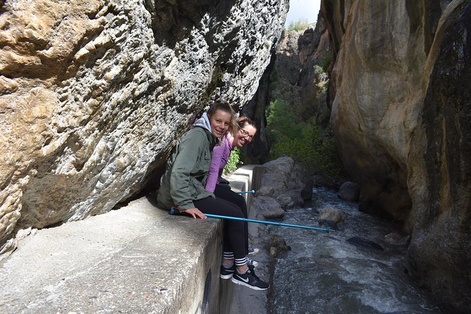 Hiking in the Canyon of the Monachil Cubs in Granada - Los Cahorros: bridges, river bends, and tight rock passages