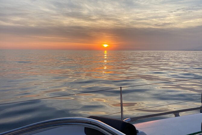 Sailing at sunset along the cliffs of Maro-Compartida - Following the cliffs of Maro-Cerro Gordo
